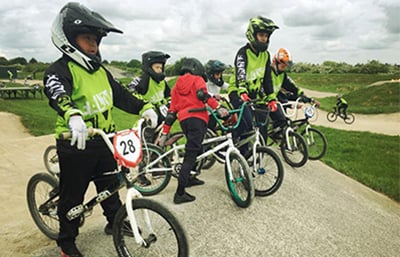 Cyclists With Bicycles